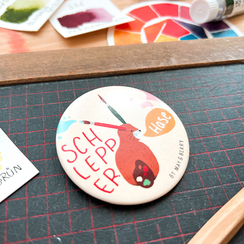 SCHLEPPERHASE Button